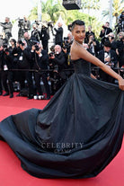 Simone Ashley black open back formal dress Cannes film festival red carpet 2024 