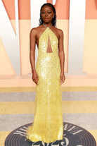 sparkly Danielle Deadwyler bright gold 2025 Vanity fair party dress