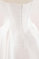 strapless buttoned back bridal dress
