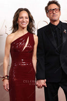 Susan Downey burgundy sequined 2025 Oscars red carpet dress