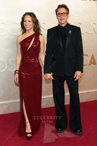 Susan Downey burgundy sheath 2025 Oscars red carpet dress