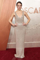 sweep train Emma Stone 2025 Oscars red carpet dress