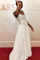 white chiffon 2025 Oscars red carpet Lupita Nyong’o dress 