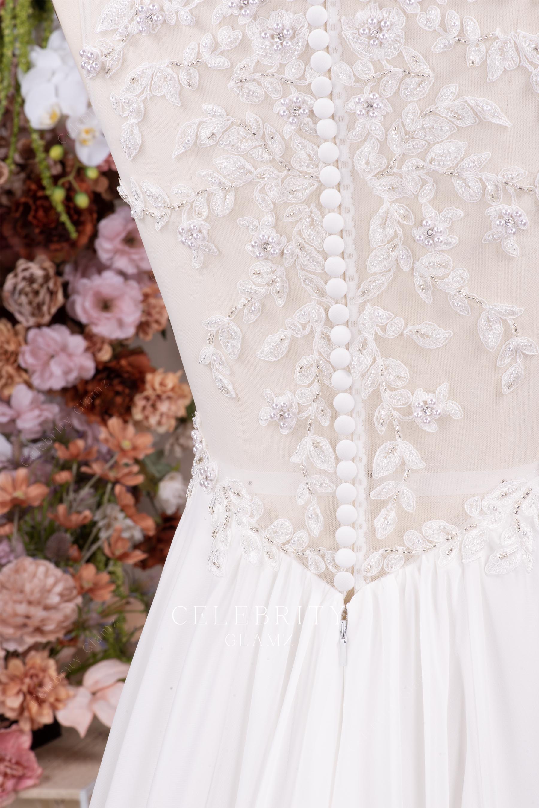 white lace buttoned back bridal dress