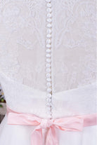 white lace buttoned back bridal dress