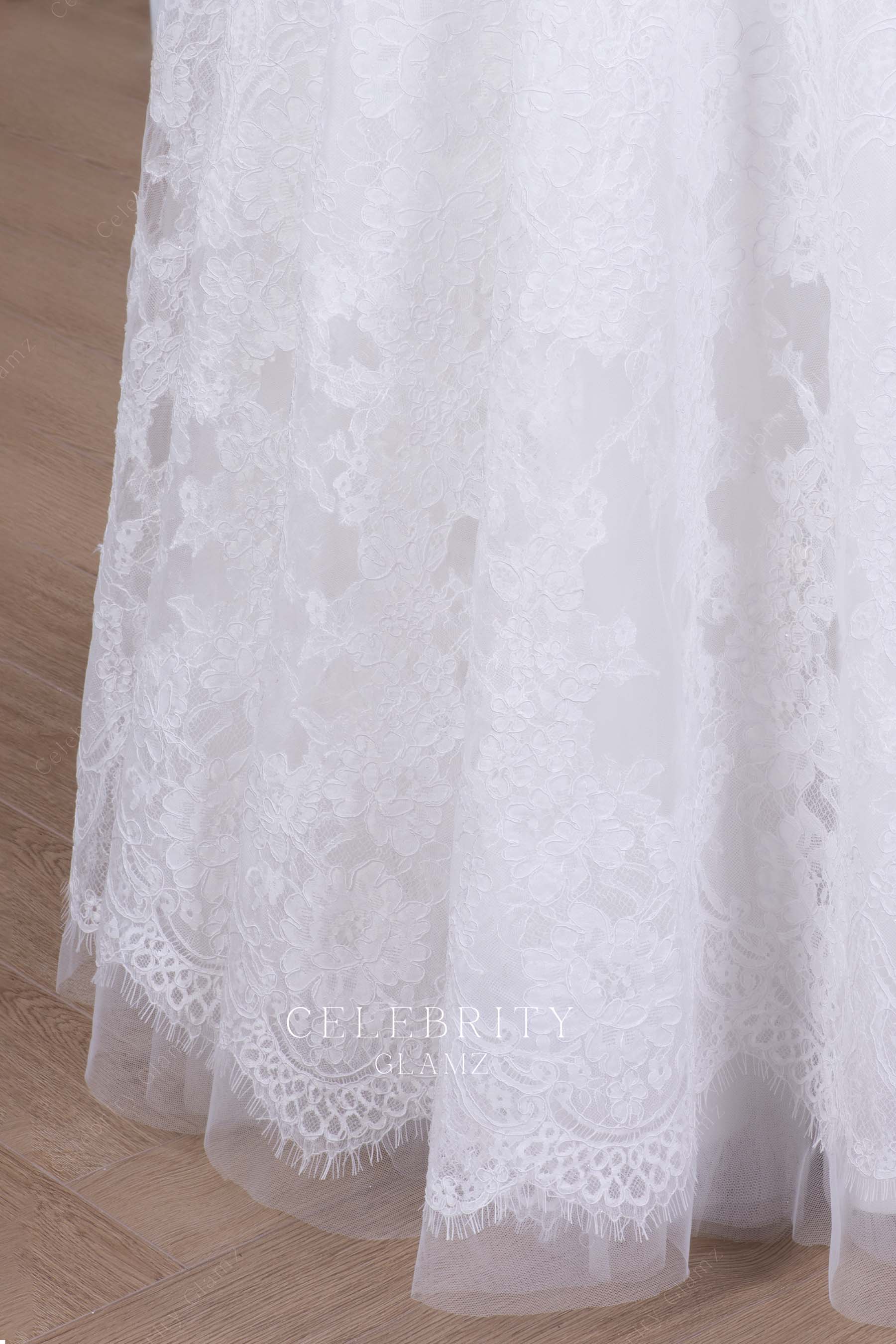 white lace floor length bridal dress