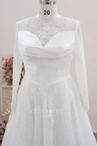 white lace long sleeve wedding dress