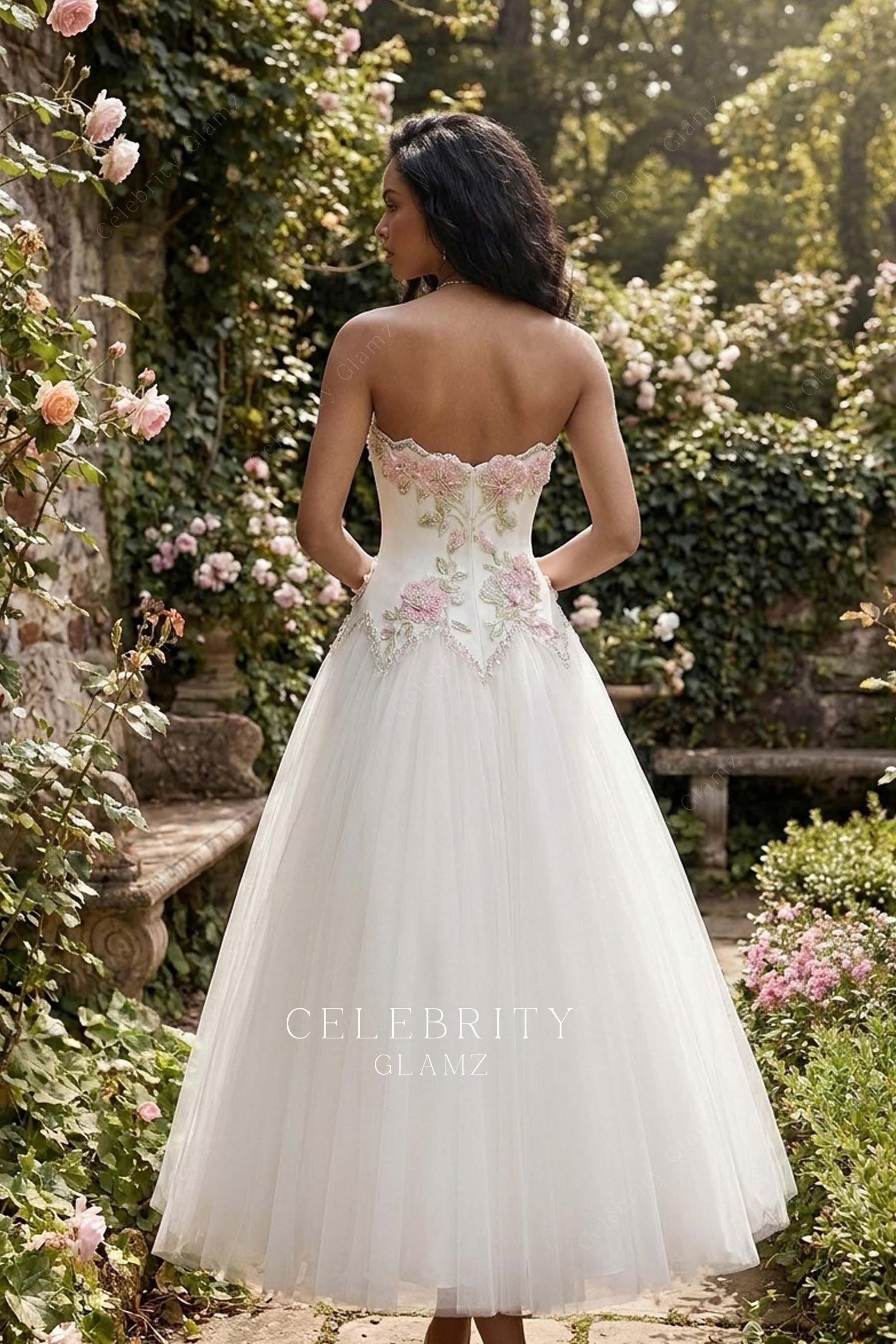 white strapless open back tulle wedding dress