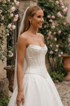 white strapless v neck wedding dress