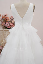white tiered tulle wedding dress