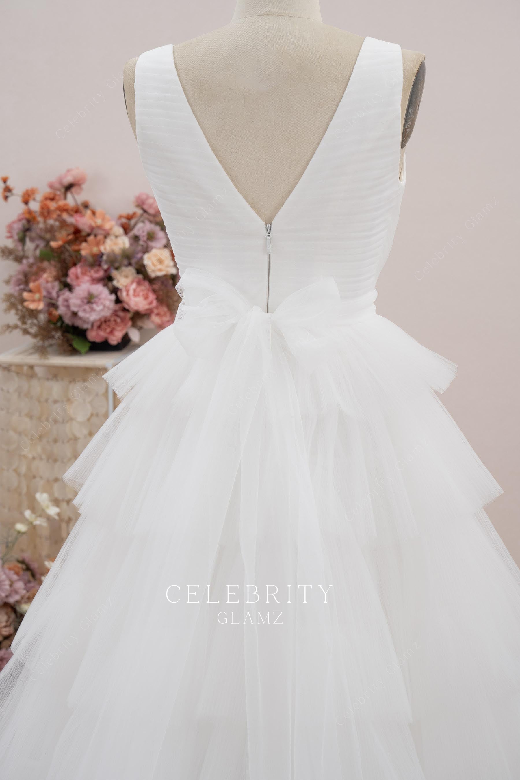 white tiered tulle wedding dress