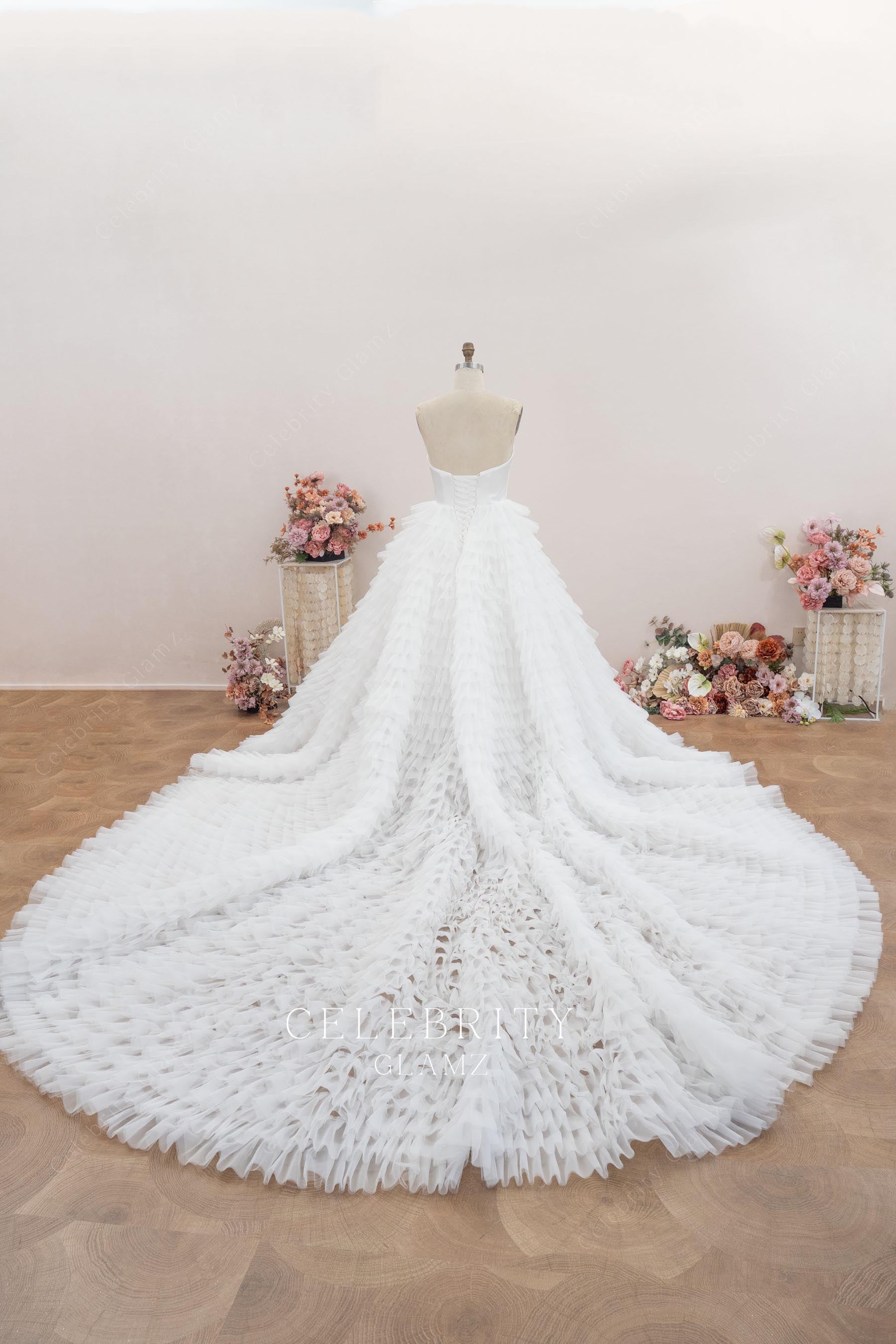 white tulle cathedral train wedding dress