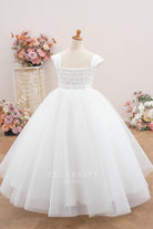 white tulle flower girl ballgown