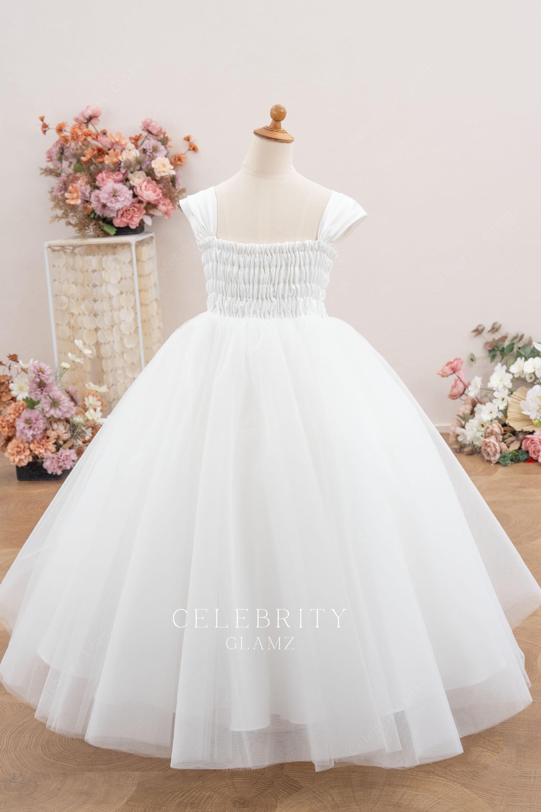 white tulle flower girl ballgown