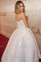 Zurihall Knight 2025 Oscars red carpet open back dress